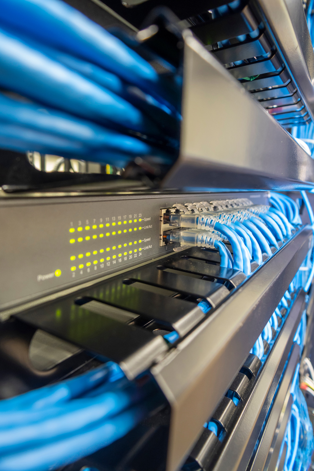 Network switch hub in rack cabinet. Network connection technology.